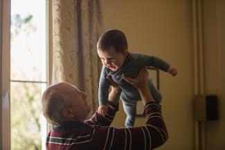 grandfather and baby grandson